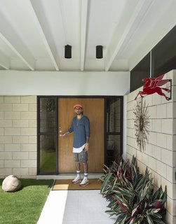 Both Christopher Florentino and his 1963 Gene Leedy-designed home stand out in their quiet Florida neighborhood.