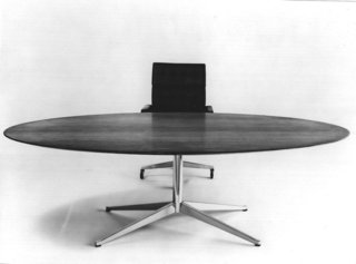 Florence Knoll's Table Desk completely upended the concept of what a desk should be. Gone were the drawers, ornate carvings and heavy, imposing presence of its corporate predecessors, replaced instead by a design that has become the gold standard of executive offices. 