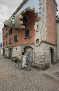 The giant zipper on the side of this Milanese building is part of Chinneck's latest installation.