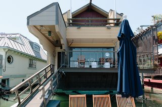 A New Book For Those Who Dream of Living in a Floating Home - Photo 6 of 11 - Located in Sausalito, California, known for its quaint houseboat community, this three-story floating home from the 1970s incorporates Japanese design details like sliding paper walls and tatami mats. The home, built by master carpenter Forbes Thor Kiddoo, was constructed using traditional Japanese joinery techniques. 