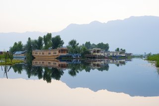 A New Book For Those Who Dream of Living in a Floating Home - Photo 10 of 11 - Originally, houseboats in India’s Kashmir region were used as hotels by British colonists during the 19th century, and today, there are more than 1,000 in the area. Sukoon, a houseboat from the 1970s, was recently transformed into an "eco-luxury" resort with five suites, a sundeck, and an elegant furnished interior. 
