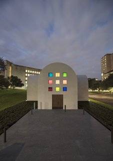 The south façade of Ellsworth Kelly's "Austin" with an entry door fabricated from live oak