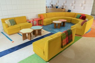 A Midcentury Time Capsule Captures an Architect's Love For Iconic Design - Photo 7 of 14 - Another furniture design by Dow, the horseshoe-shaped sofa in the game room was manufactured by the furniture maker Herman Miller. 