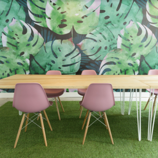 Bold murals give Toronto's female co-working club, Make Lemonade, energizing pops of color throughout the space.