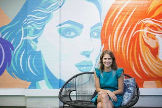 One Roof's walls are covered in bright, graphic murals of females.