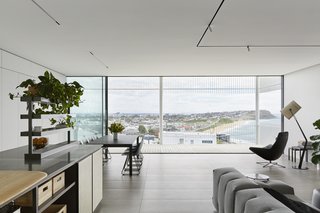 A transparent balcony allows unobstructed views of the sea and Newcastle's city skyline.