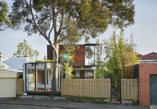 With the property bookended by two streets, the architects designed two front yards.