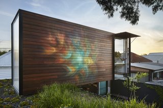 On the exterior of the office, a mural dubbed "Awakened Flow" by Seb Humphreys echoes the tranquil energy of the home. 