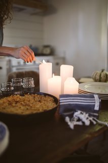 Create soft lighting with candles or a crackling fire.