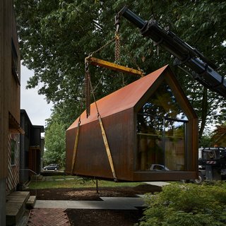 Outfitted with a desk, storage, and wiring, the Site Shack is equipped for work.