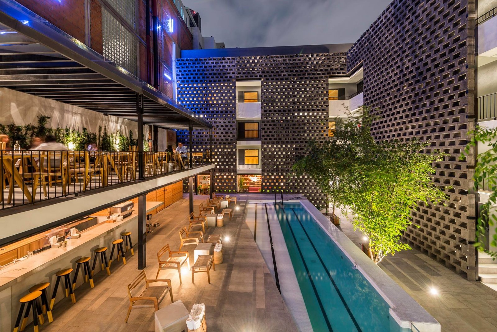 Chic poolside dining at Hotel Carlota.