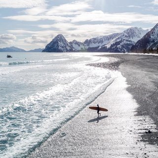 Surfing in Seward, Alaska.