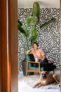 Encarnacion and Zoey soak up some sun in her office. 