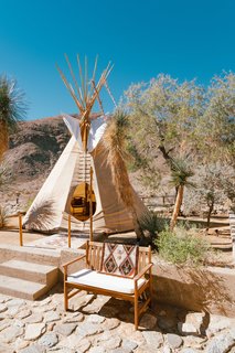 "The teepee is 26’ canvas with pine lodge poles. It’s simple in construction as it was originally intended to be a nomadic dwelling. It is extremely reliable in the high desert winds and even great in the rain. We have a small fire pit in there to keep it toasty on cool winter evenings. It’s one my favorite places on the property."
