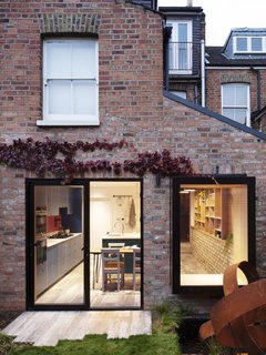 A view of the new space in London stock brick from the backyard.