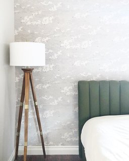 Rose installed wallpaper, adding some texture to the otherwise minimalist space. 