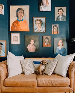 Her pup's favorite spot is the sofa under the art wall, which oozes with strong female energy.