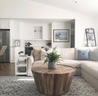 Hartley makes styling on a budget look good with a slipcovered IKEA sectional.