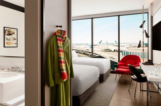 TWA Hotel celebrates its history with vintage uniforms on display. Pictured here is a Stan Herman flight attendant pantsuit from 1975.