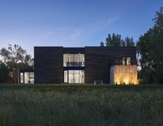 PLaN Architecture designed this home to create connections and separations from the outlying prairie of South Dakota. The plan was to craft spaces that would be open and inviting, and others that would be secluded and private, despite the flat landscape.