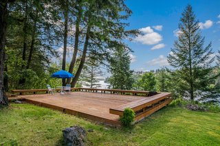 A Waterfront Washington Home Designed by a Renowned Spokane Architect Is Listed For $675K - Photo 3 of 10 -