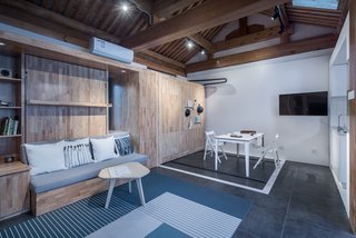 A Smart TV Controls the Layout of This Futuristic Beijing Home - Photo 2 of 11 -