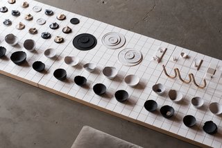 UMÉ Studio's Bouton dishes, sculptural Erod soaps, and bowls from their Concrete series. All are available for purchase on the studio's website.