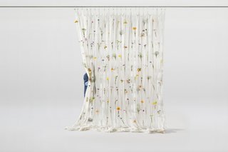 Stockholm-based textile designer Akane Moriyama, a member of UMÉ Studio, first created the Draped Flowers Curtain when she produced it in linen for an installation in Stockholm in 2010.<br><br>Seven years later, after working on design commissions and large-scale art installations, she revisited Draped Flowers with the introduction of a new and innovative material: thread made from paper.