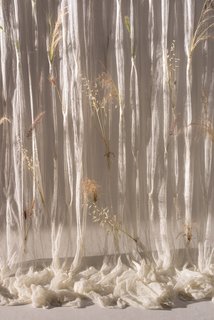 The Draped Flowers Curtain is "produced in a limited run of 30 pieces and every step takes place in a different small factory in Japan, each dedicated to its own unique craft and technique," says the studio.