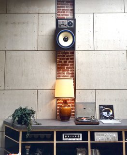 Exposed brick and a 1970s sound system add to Proud Mary's homey vibe.