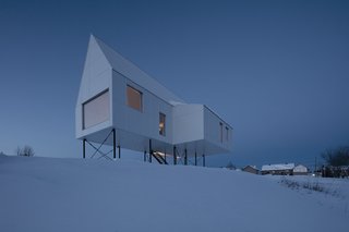 A Minimalist Winter Chalet Stands Tall on Stilts - Photo 4 of 6 -