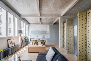 An Ingenious Gold Island Transforms an Industrial Apartment in Paris - Photo 7 of 16 -