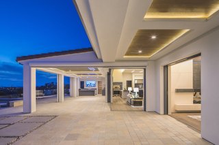 8 Things to Consider When Choosing Retractable Glass Walls - Photo 3 of 15 - Pocketing glass doors slide out of sight.