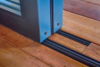 8 Things to Consider When Choosing Retractable Glass Walls - Photo 8 of 15 - A flush threshold provides a seamless experience.
