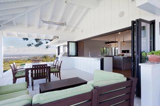 8 Things to Consider When Choosing Retractable Glass Walls - Photo 14 of 15 - LaCantina’s combination Door & Window system connects their bifold doors to their bifold windows without the need for a supporting post