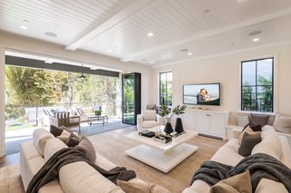 8 Things to Consider When Choosing Retractable Glass Walls - Photo 4 of 15 - Folding doors stack accordion-like for a dramatic effect.