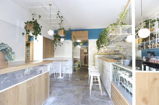 A minimal but elegant palette of materials keeps the restaurant looking bright and airy.