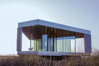 Go Stargazing in This Off-Grid Glass Prefab Nestled in the Desert - Photo 4 of 13 - The prefab house is completely off-grid.