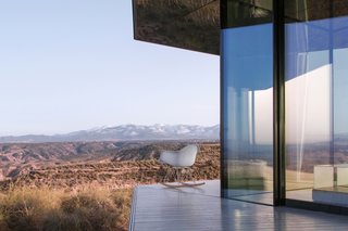 Go Stargazing in This Off-Grid Glass Prefab Nestled in the Desert - Photo 2 of 13 - The near-invisible coatings on the glass protect the interior from solar gain.