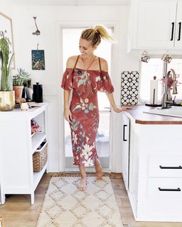 A Couple Spend $3K to Turn an Old RV Into a Cozy Home For Five - Photo 2 of 10 - The cabinets were refaced to match the new aesthetic.
