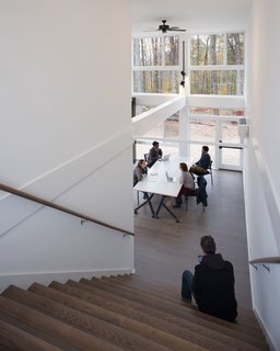 A Shipping Container Prefab Lab Is Built in Only 4 Hours - Photo 7 of 12 - The stairs double as auditorium-style seating.