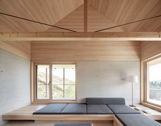 A Minimalist Home Is Built Into Steep Terrain in an Austrian Valley - Photo 3 of 13 - By only using a few different materials, the minimalist home has a crisp and clean appearance.