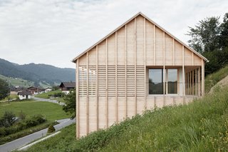 A Minimalist Home Is Built Into Steep Terrain in an Austrian Valley - Photo 7 of 13 - The roof was built with prefabricated wood elements.
