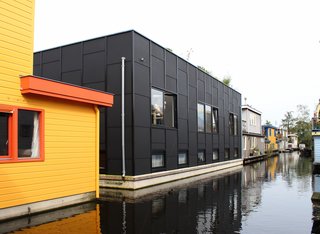 Named the Tatami House, the houseboat resembles the size and layout of traditional Japanese tatami rooms. "We used the tatami as a grid for the house," explains Julius Taminiau, referring to how tatami—a rectangular straw mat typically measuring 35 by 70 inches—dictates the size and proportion of traditional Japanese spaces.