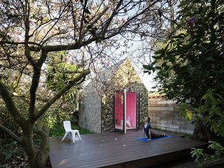 Over 4,500 3D-printed ceramic tiles clad the 120-square-foot building.