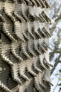 The ceramic tiles are made using customized G-code to control the printing of each line of clay.