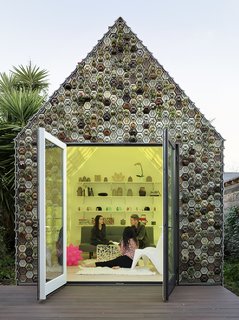 The succulent planter facade is a low-maintenance living wall.