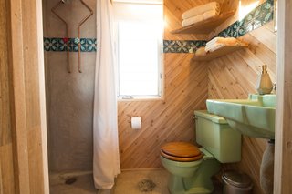 The Clubhouse is the communal hub, housing the bathrooms, kitchen, and shared living space.