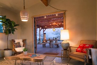 Guests can enjoy a hot tub, outdoor shower, outdoor kitchen, communal table, and fireplace.