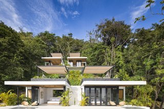 Backed by greenery and set facing the Pacific Ocean, each suite at the hotel takes in the best of Santa Teresa's landscapes.